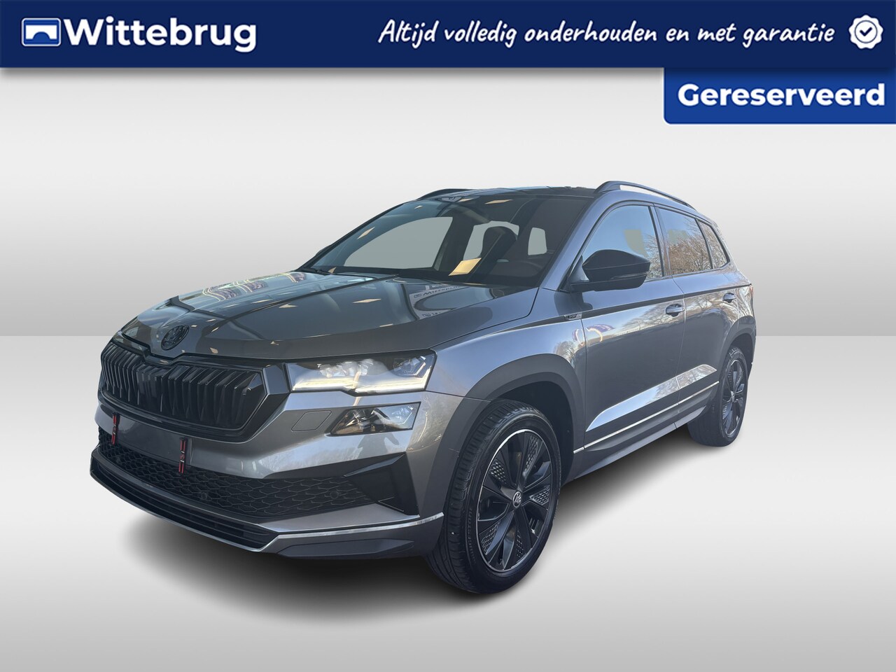 Skoda Karoq - 1.5 TSI ACT Sportline Business / Afneembare trekhaak / Achteruitrijcamera / 18" lichtmetal - AutoWereld.nl