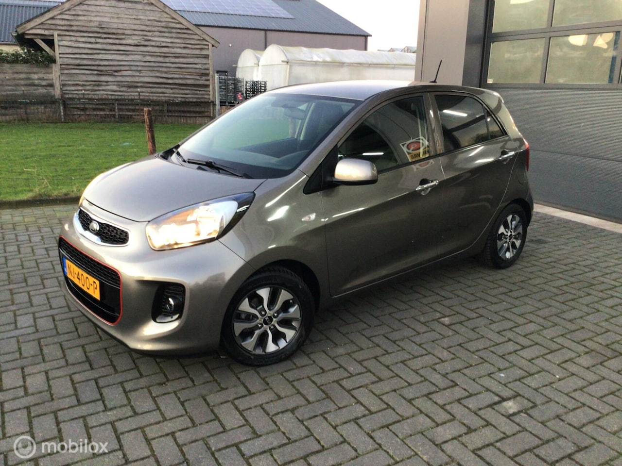 Kia Picanto - 1.0 CVVT Plus line. Navi. Camera/nette auto. - AutoWereld.nl