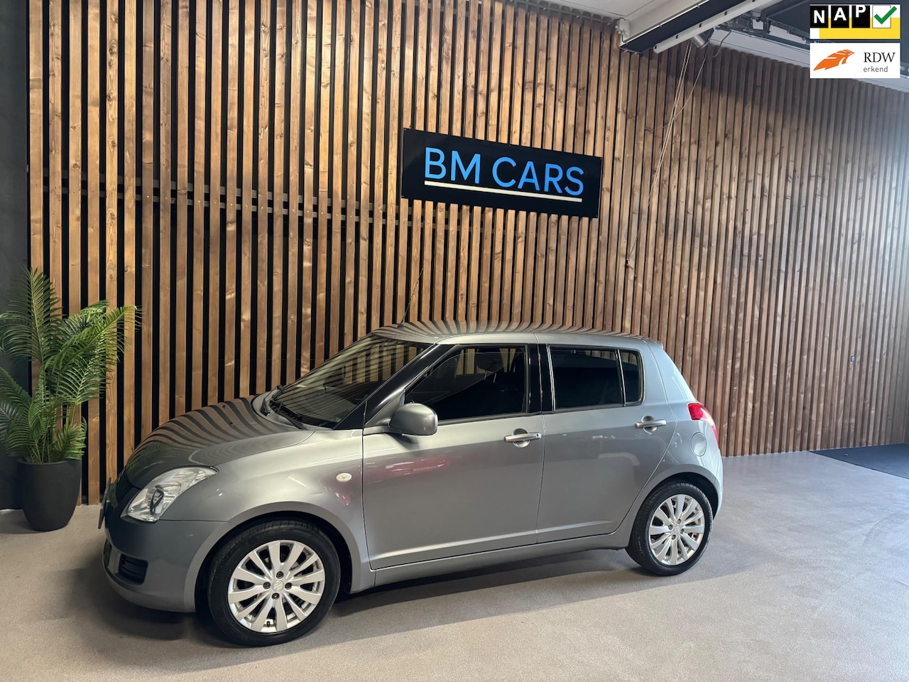 Suzuki Swift - 1.3 Cool 5 deurs,Airco,Weinig KM,Nieuwe APK - AutoWereld.nl