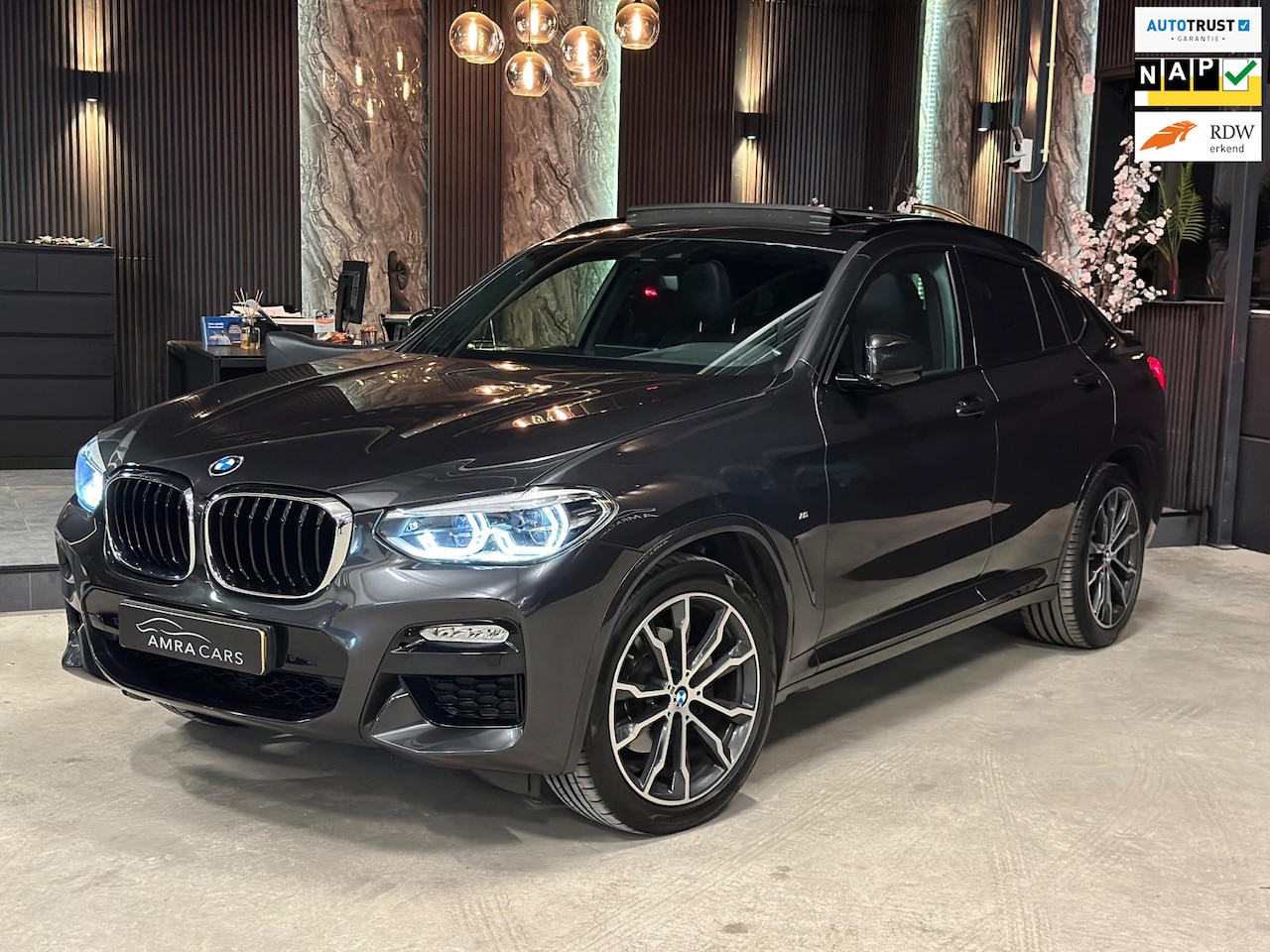 BMW X4 - XDrive20i M Sport|PANO|BOMVOL! - AutoWereld.nl