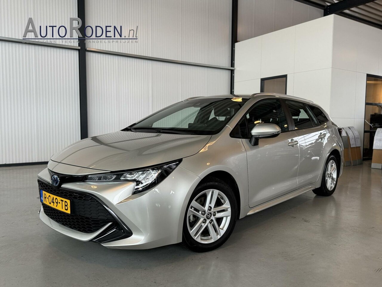 Toyota Corolla Touring Sports - 1.8 Hybrid 90kw Active Touring Sports|Camera|CarPlay|Adapt.Cruise| - AutoWereld.nl