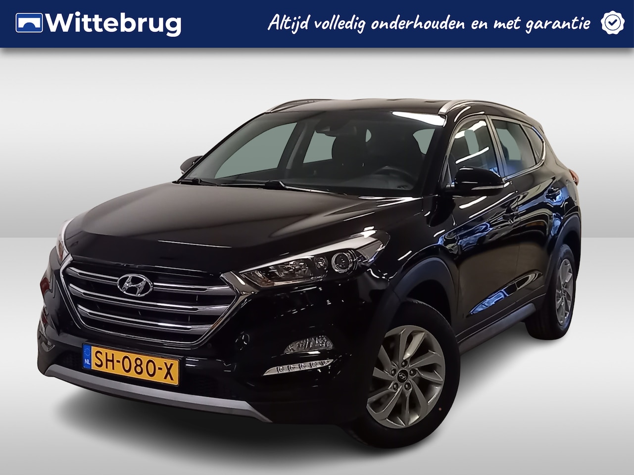 Hyundai Tucson - 1.6 GDi Comfort Parkeersensoren voor en achter, stoelverwarming en Apple Carplay, Android - AutoWereld.nl