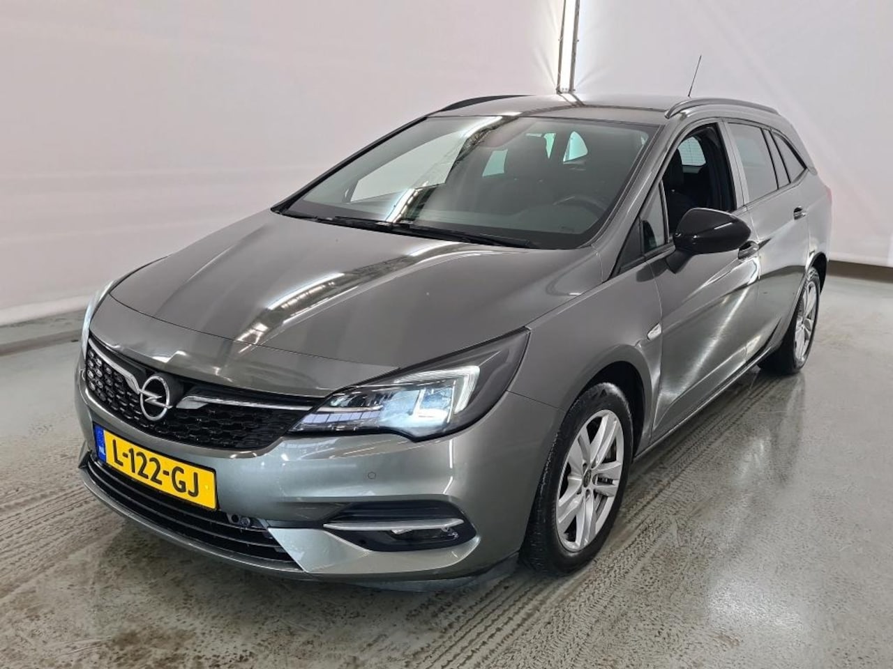 Opel Astra Sports Tourer - 1.4 Business Edition | Automaat | Stoel + Stuur verwarming | Parkeersensoren V+A - AutoWereld.nl