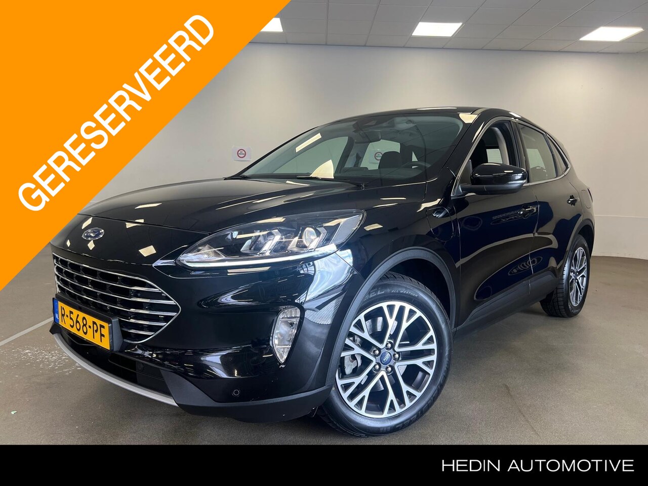 Ford Kuga - 2.5 PHEV Titanium Stoel / stuurverwarming | all season banden | 1 jr Bovag | keyless entry - AutoWereld.nl