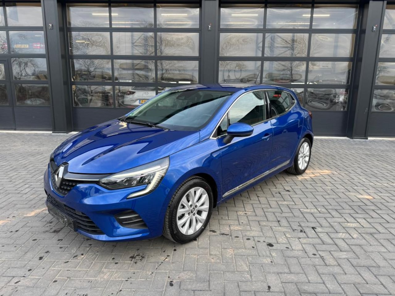 Renault Clio - 1.0 TCe Intens Groot scherm / Stuurwiel verwarming - AutoWereld.nl