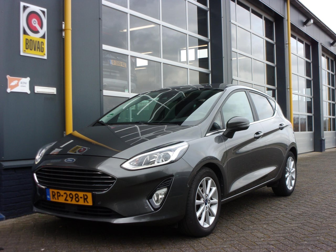 Ford Fiesta - 1.0/100pk Titanium ECC TH CAM NAV TEL CrC PDC VenA LMV 16INCH - AutoWereld.nl