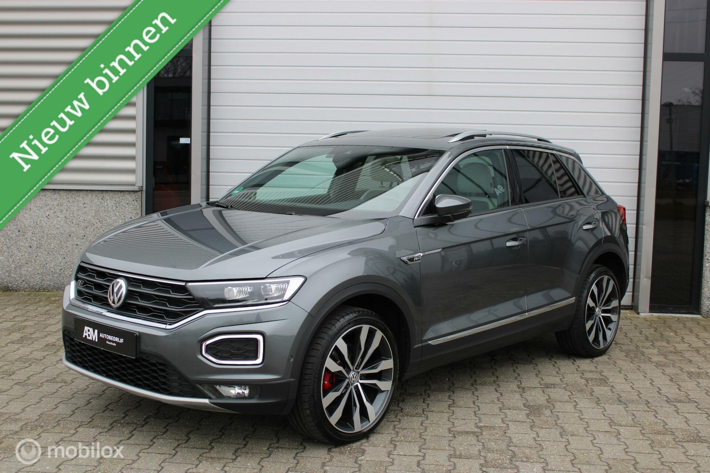 Volkswagen T-Roc - 2.0 TSI 4Motion R-Line PANO VIRTUAL BEATS - AutoWereld.nl