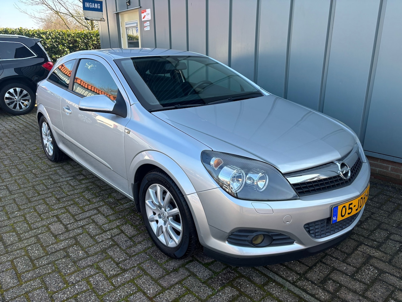 Opel Astra GTC - 1.8 Business APK//NAP//Airco//Navi//Cruise//Elec.Ramen//CV+AB//Trekhaak//PDC// - AutoWereld.nl