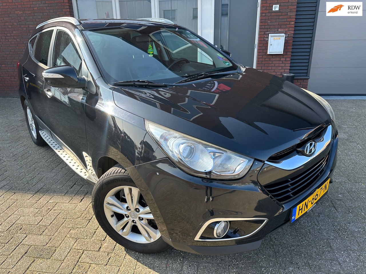 Hyundai ix35 - 2.0i Style / Leder / Navi / PDC / Cruise - AutoWereld.nl