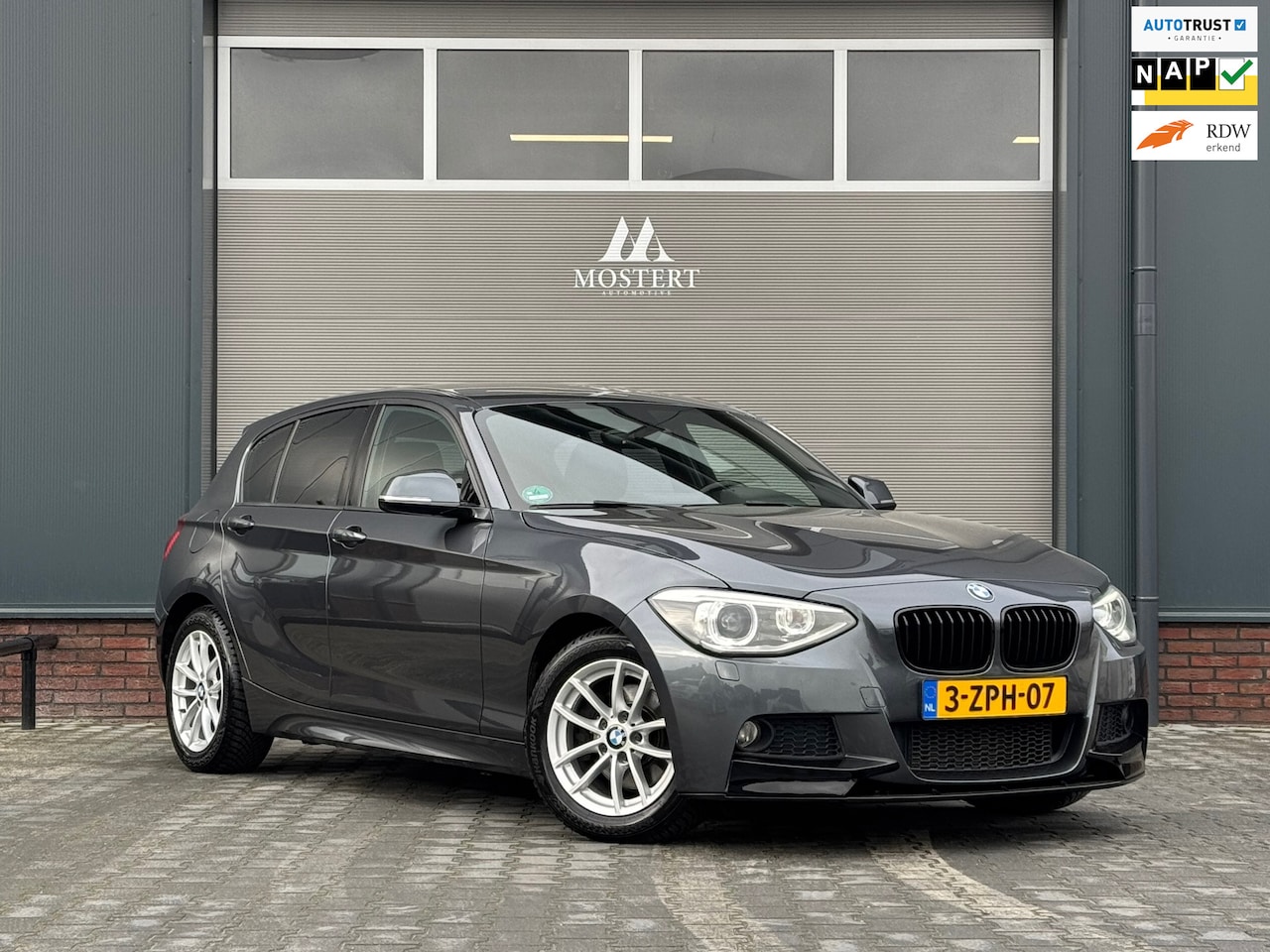 BMW 1-serie - 118i/170pk Executive M-sport|2015|M-Pakket|Trekhaak|Cruise|Navi|PDC - AutoWereld.nl