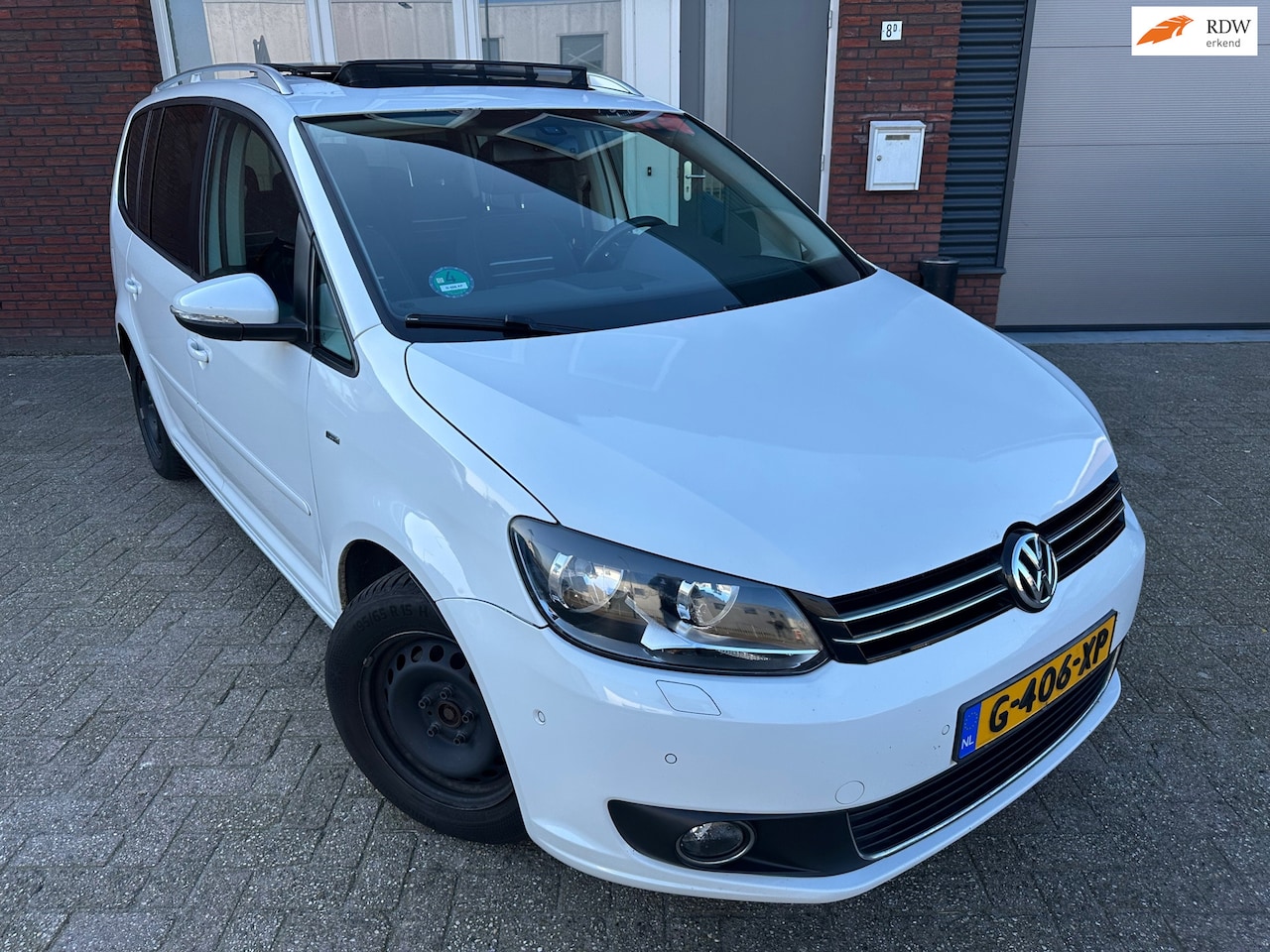 Volkswagen Touran - 1.2 TSI Highline BlueMotion 7p. / Pano / Navi / PDC / Cruise - AutoWereld.nl