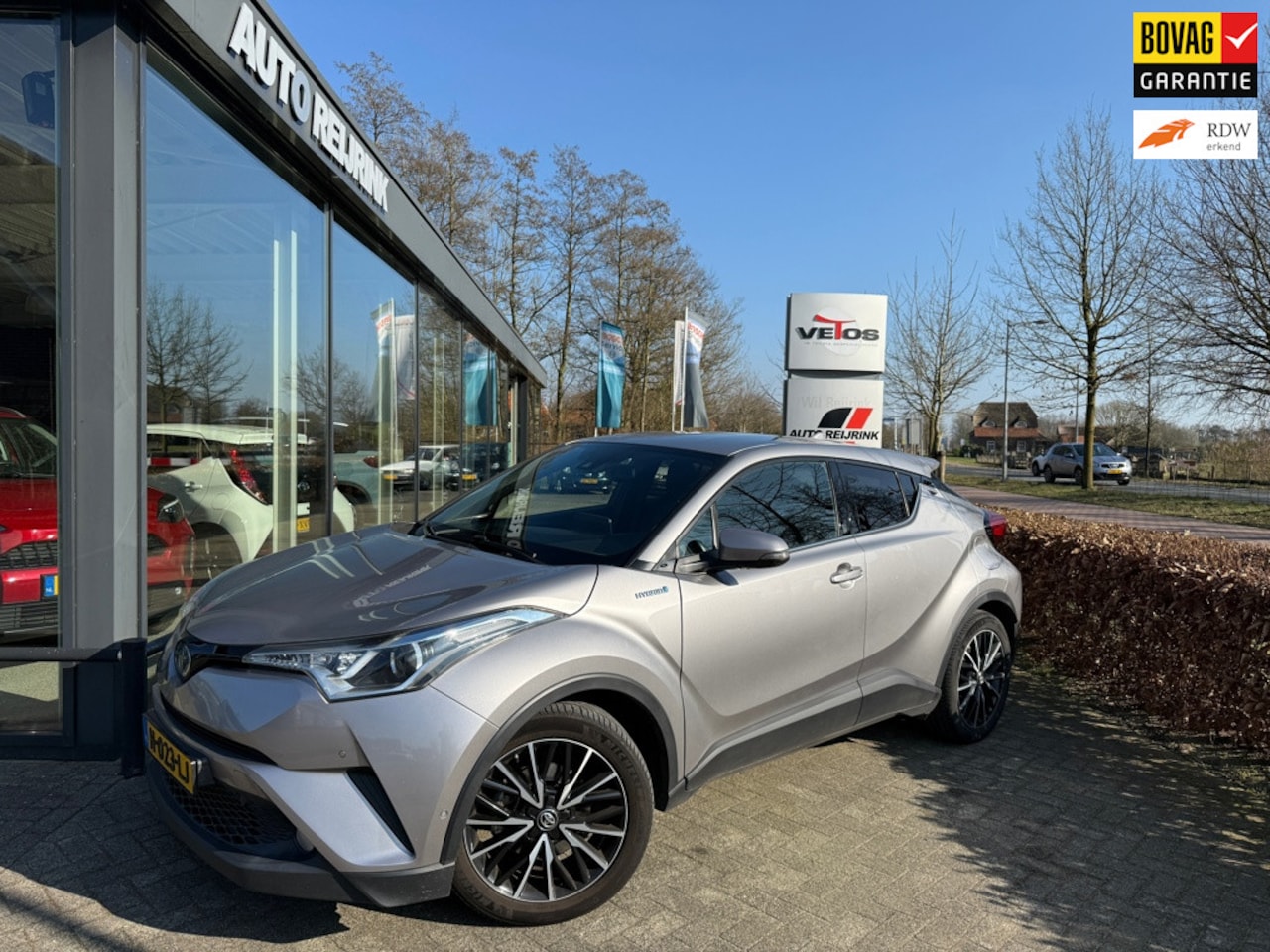 Toyota C-HR - 1.8 Hybrid executive/ Team D Navigatie, - AutoWereld.nl