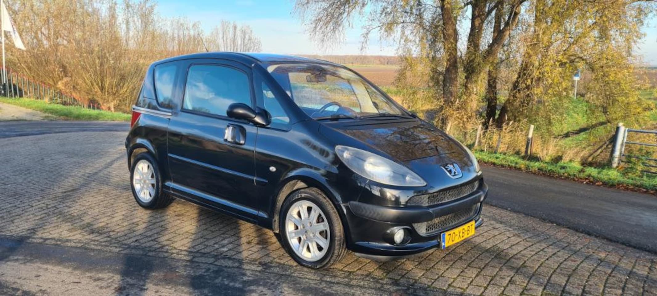 Peugeot 1007 - 1.4-16V Sporty 1.4-16V Sporty - AutoWereld.nl