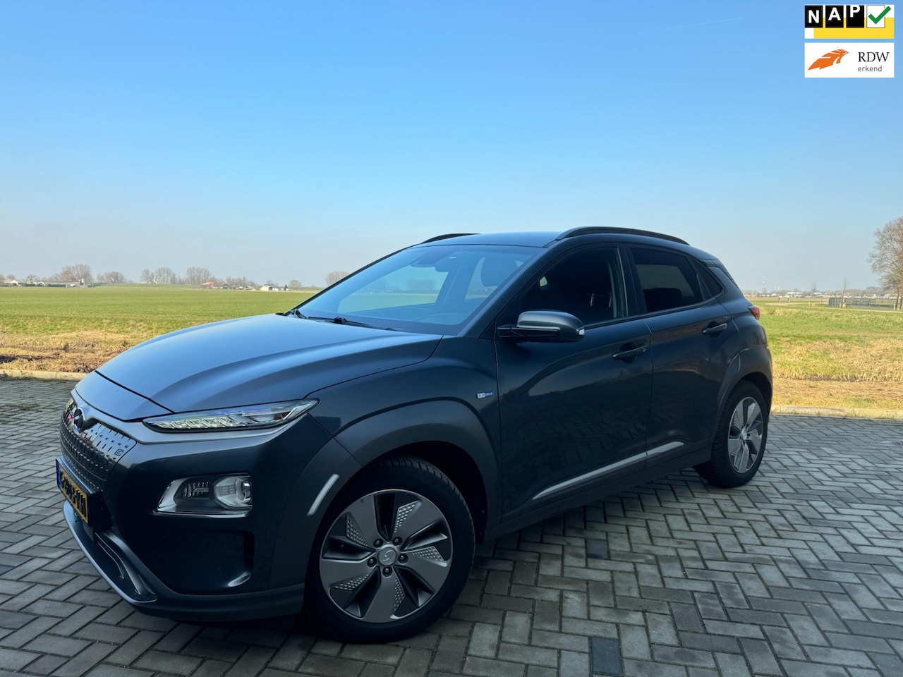 Hyundai Kona Electric - EV Premium 64 kWh 2019 204PK Stoelverwarming / Koeling Leer Carplay Navi - AutoWereld.nl