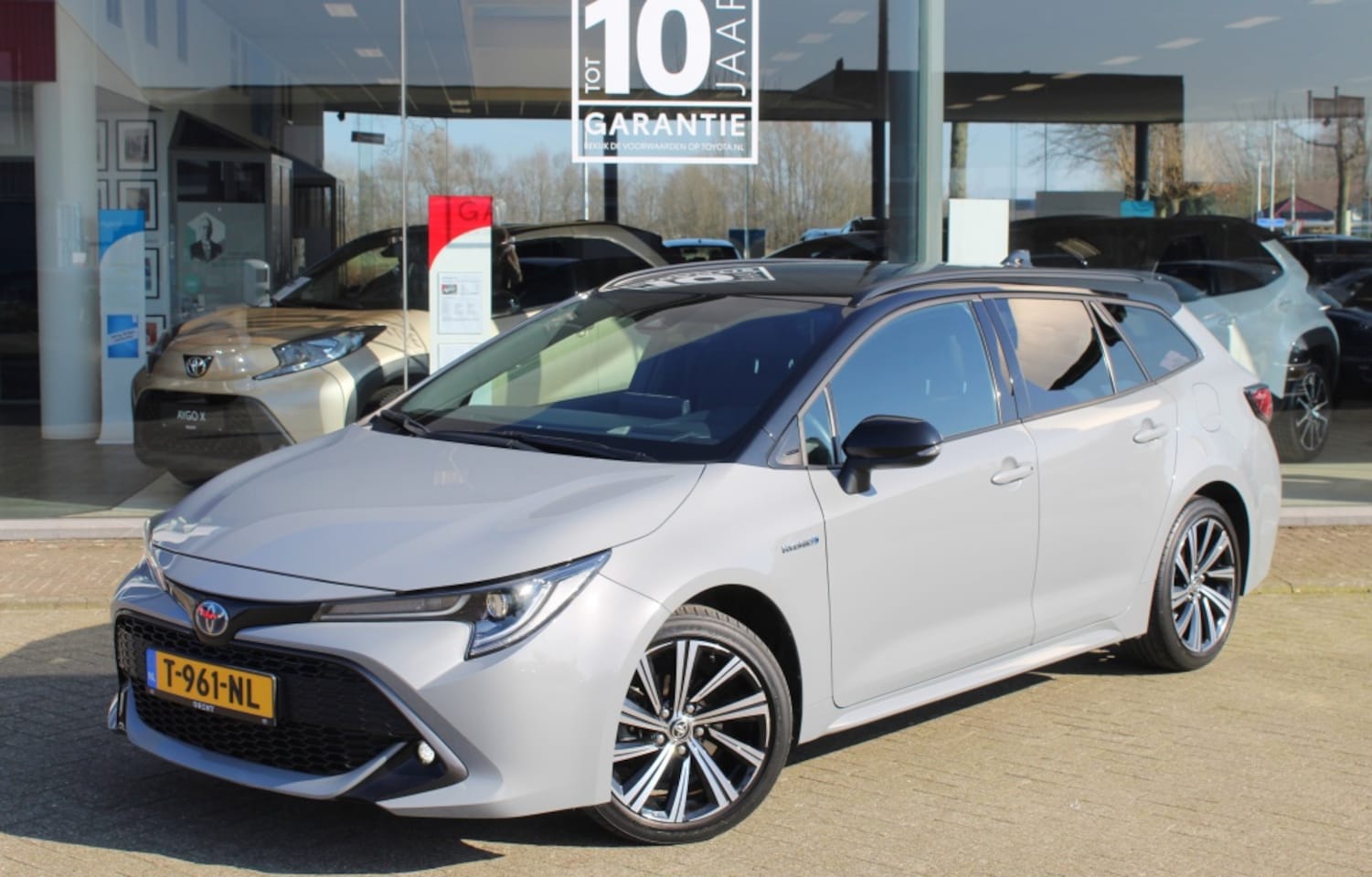 Toyota Corolla Touring Sports - 1.8 Hybrid Style Bi-tone | Head-Up Display | Sensoren v/a | Andr - AutoWereld.nl