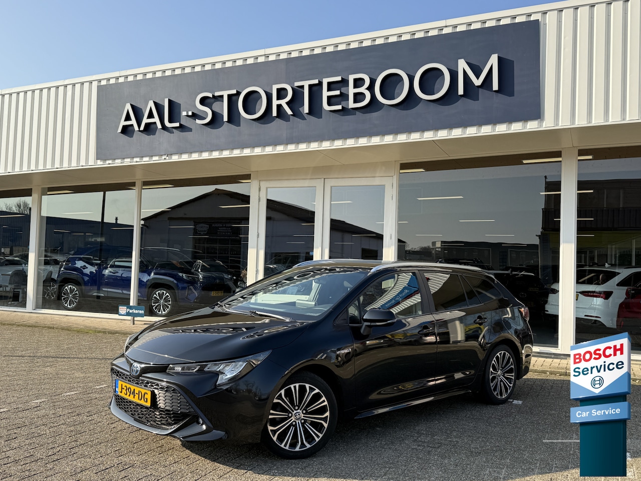 Toyota Corolla Touring Sports - 1.8 Hybrid Business Plus | LED | Adapt. Cruise | Apple Carplay | Keyless | Camera | Trekha - AutoWereld.nl