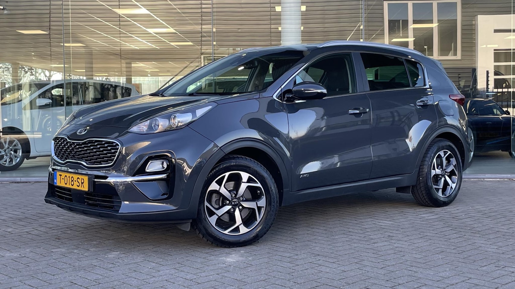 Kia Sportage - 1.6 T-GDI 4WD DynamicLine AWD| NAV | CLIMA | CAMERA | ADAP.CRUISE | TREKHAAK - AutoWereld.nl