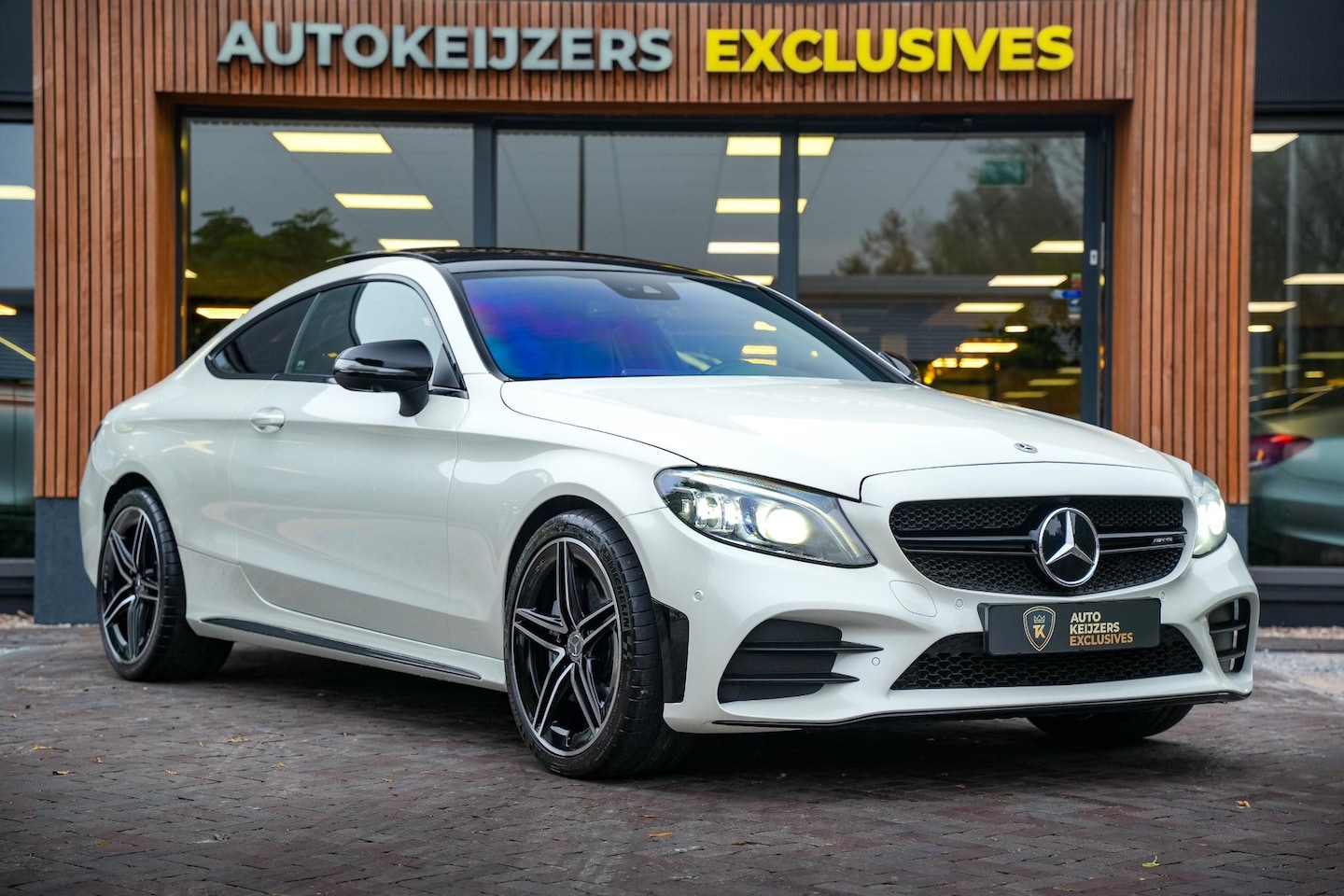 Mercedes-Benz C-klasse Coupé - AMG 43 4MATIC Panodak Burmester Schaalstoelen Ambient Keyless 360 Cam - AutoWereld.nl