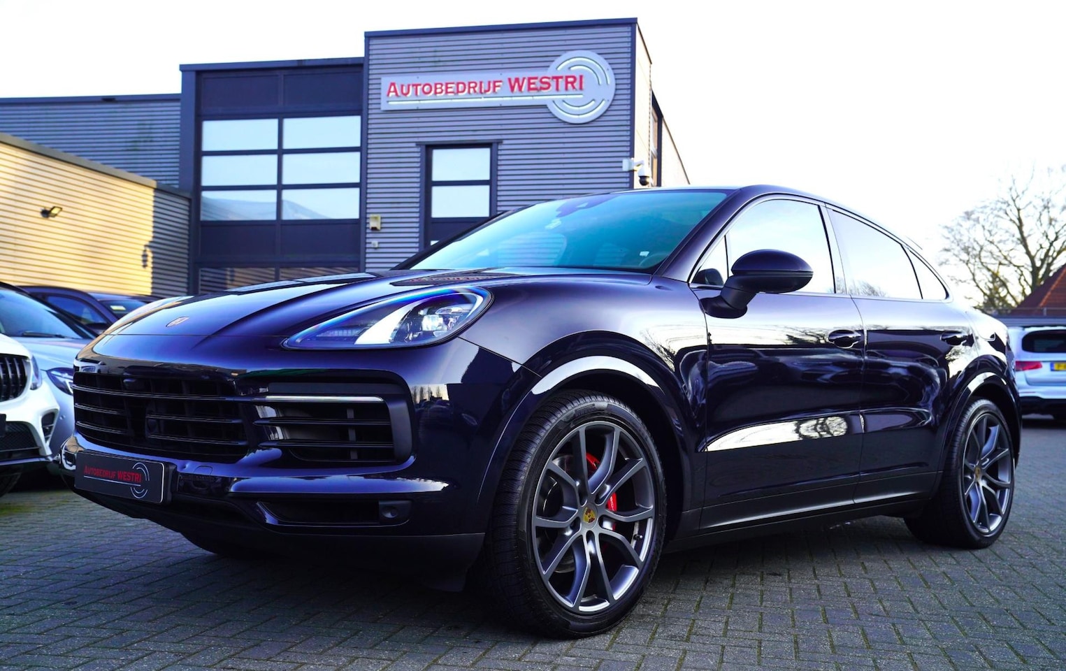 Porsche Cayenne Coupé - 3.0 E-Hybrid | Panorama | Luchtvering | Porsche Active Save | Massage | 21 inch | Adaptiev - AutoWereld.nl