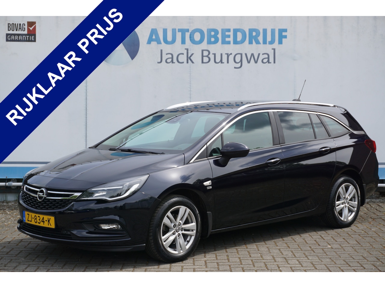 Opel Astra Sports Tourer - 1.0 Turbo 120 Jaar Edition Trekhaak | PDC | Navi *All in prijs* - AutoWereld.nl