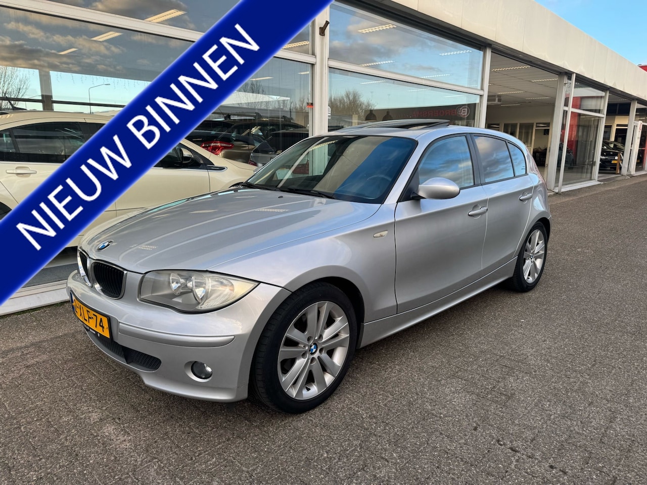 BMW 1-serie - 116i Executive | Airco | Navigatie | Leder interieur | Schuif-kanteldak | APK t/m 10-02-20 - AutoWereld.nl