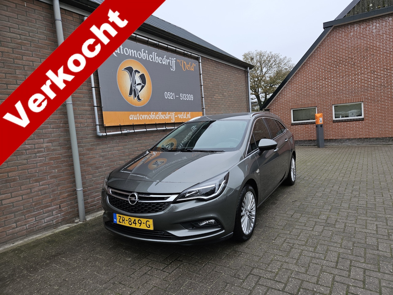 Opel Astra Sports Tourer - 1.4 Turbo 120 Jaar Edition 1.4 Turbo 120 Jaar Edition - AutoWereld.nl