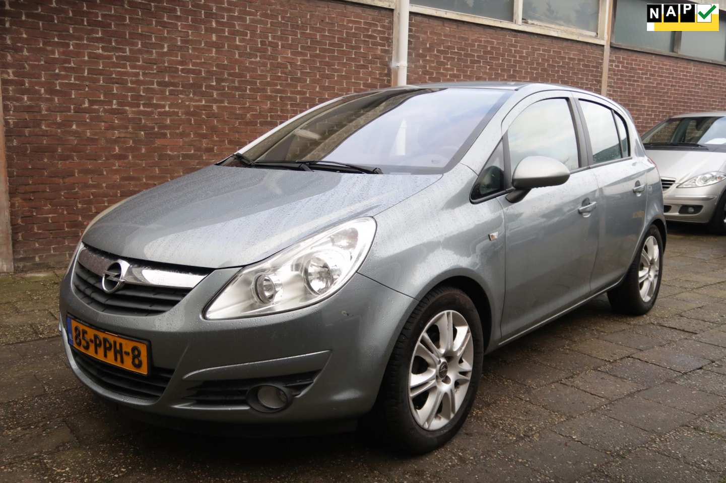 Opel Corsa - 1.4-16V Cosmo 1.4-16V Cosmo, CLimate + Cruise control, LM Velgen, Trekhaak, stuurbediening, half lederen - AutoWereld.nl