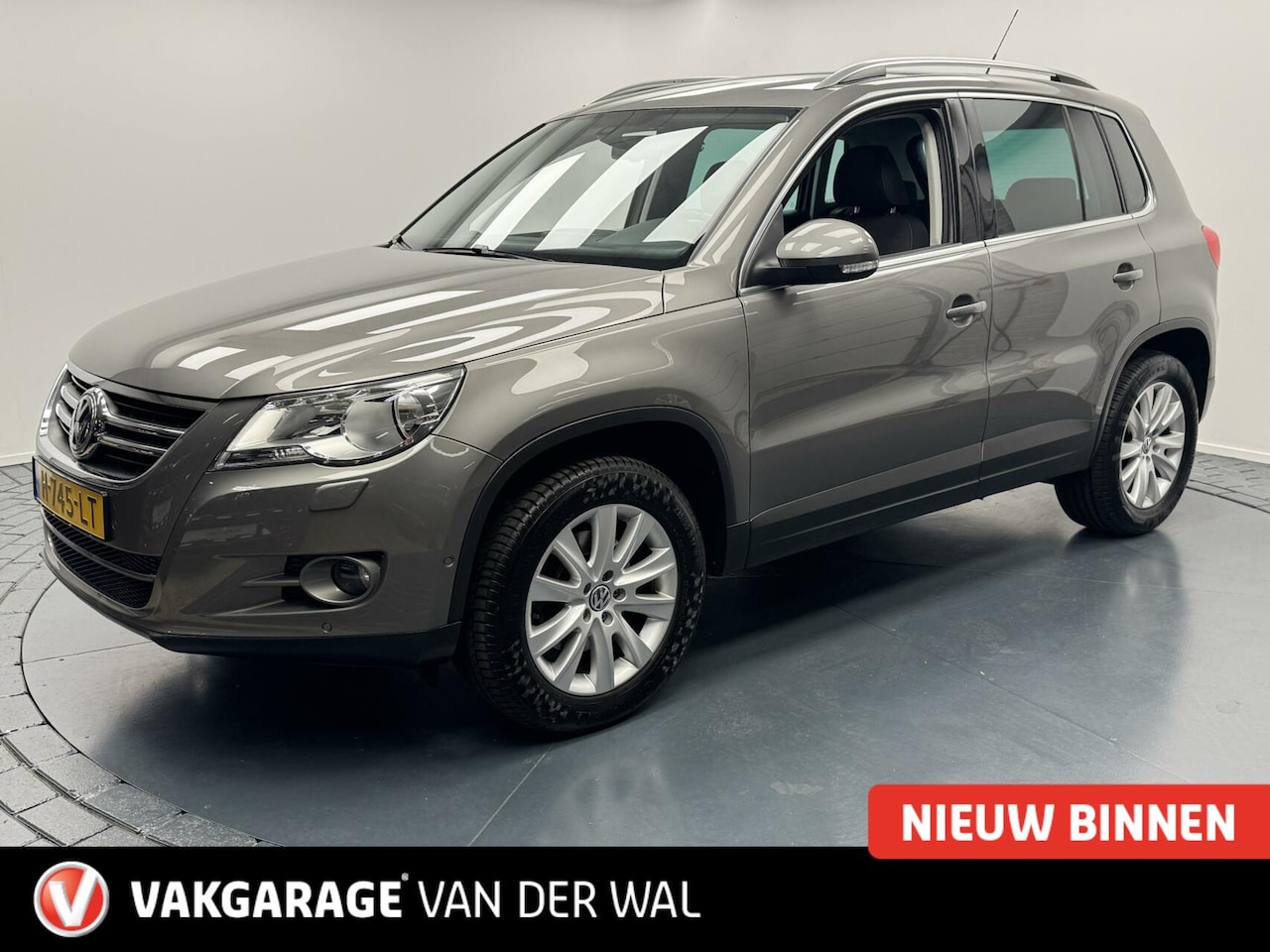 Volkswagen Tiguan - 1.4 TSi Comfort&Design Trekhaak-Cr.contr-Clima-Lm17''velgen-Stoelverwarming-Parkeersensore - AutoWereld.nl