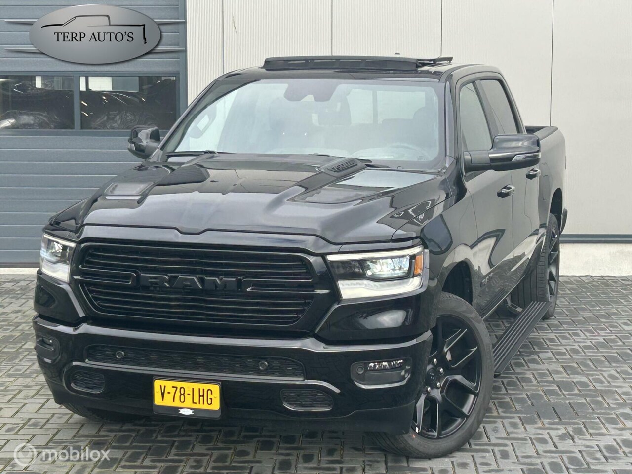 Dodge Ram 1500 - 4X4 5.7 V8 4x4 Crew Cab Sport - AutoWereld.nl