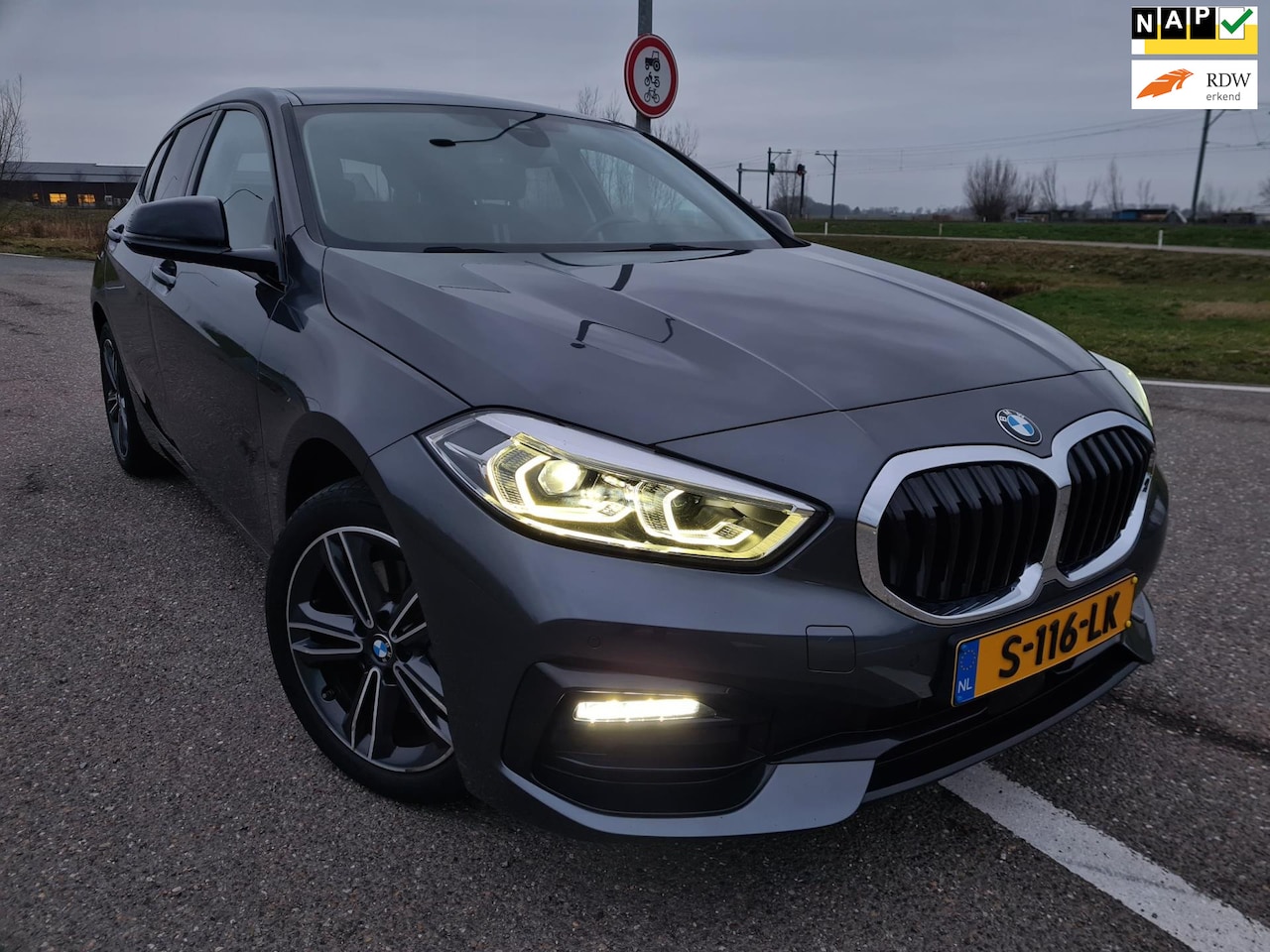 BMW 1-serie - 118i High Executive/AUT8/HUD/DEALER ONDH/CAR PLAY - AutoWereld.nl