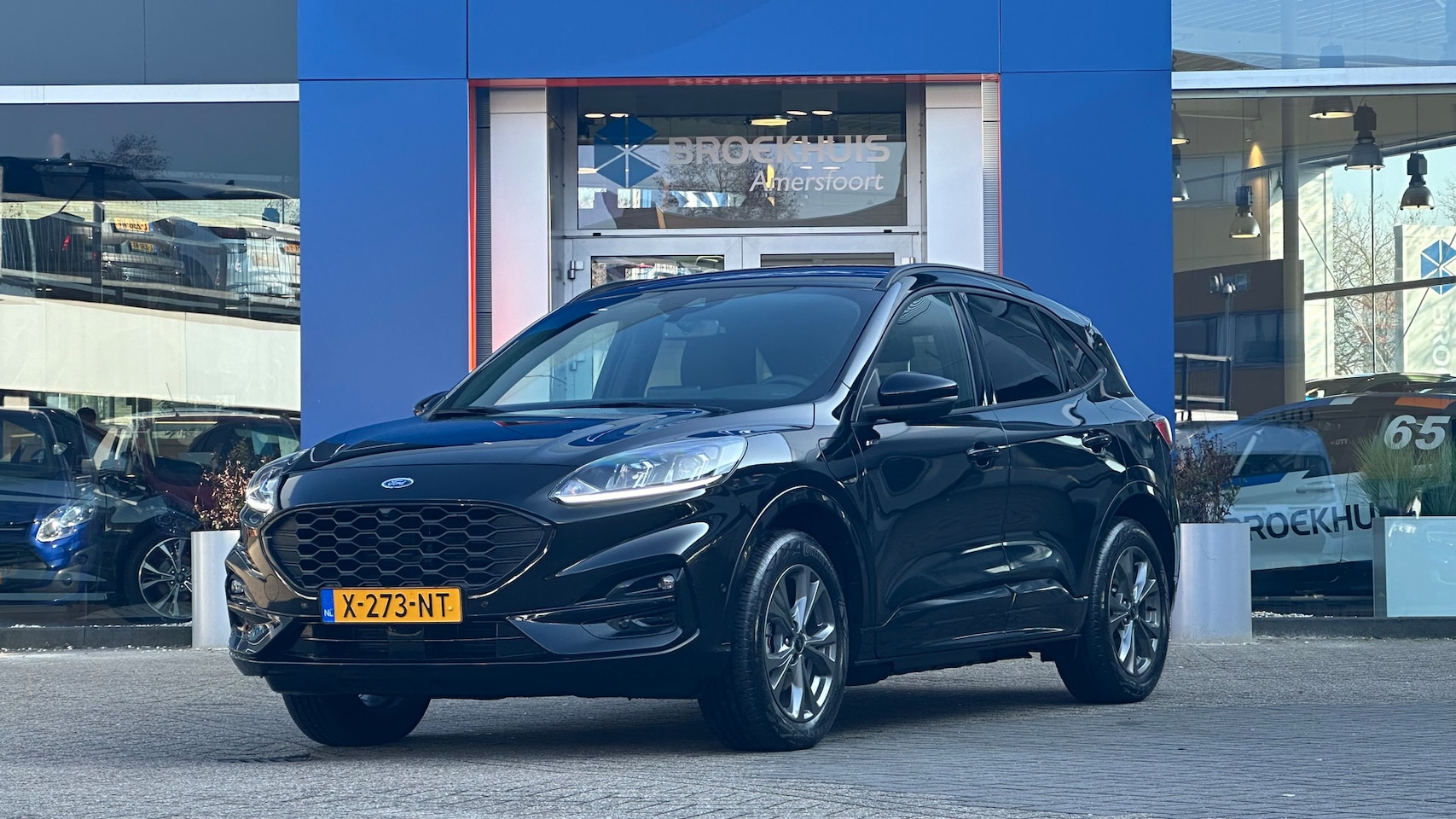 Ford Kuga - 2.5 PHEV ST-Line | camera voor | cruise control adaptief met Stop&Go en stuurhulp | keyles - AutoWereld.nl