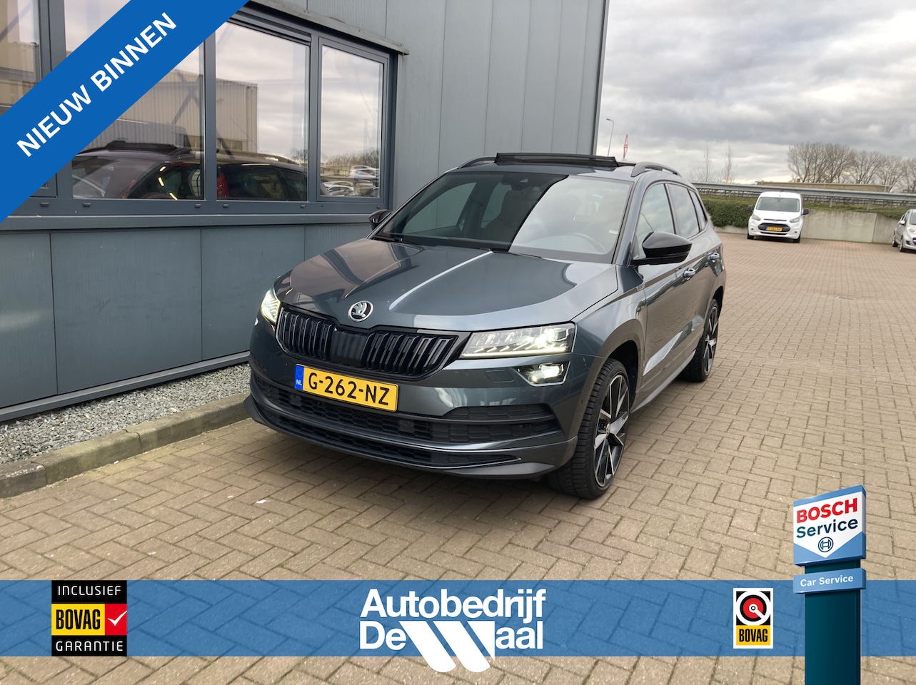 Skoda Karoq - 1.5 TSi 150pk DSG Sportline Business SCHUIFDAK/CANTON/DODEHOEK/ADAPT.DEMPING/TREKH.WEGKLAP - AutoWereld.nl