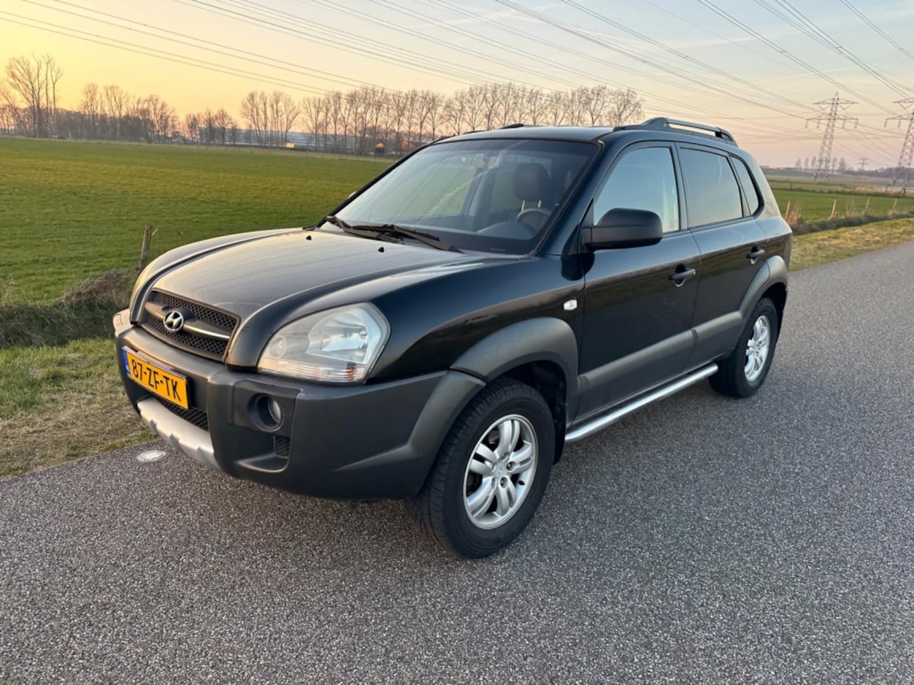 Hyundai Tucson - 2.0i Dynamic Cross AIRCO | CRUISE CONTROL | TREKHAAK ! - AutoWereld.nl