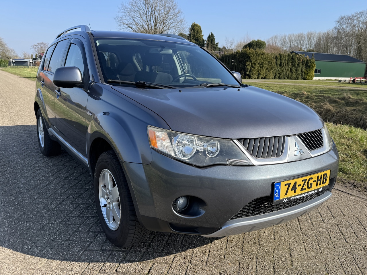 Mitsubishi Outlander - 2.4 Intro Edition 2WD ECC/CRUISE/NETTE AUTO! - AutoWereld.nl