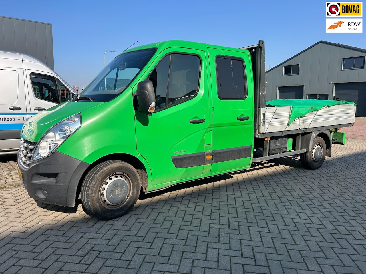 Renault Master - T35 2.3dCi 125PK L3 DC Open laadbak met kraan - AutoWereld.nl