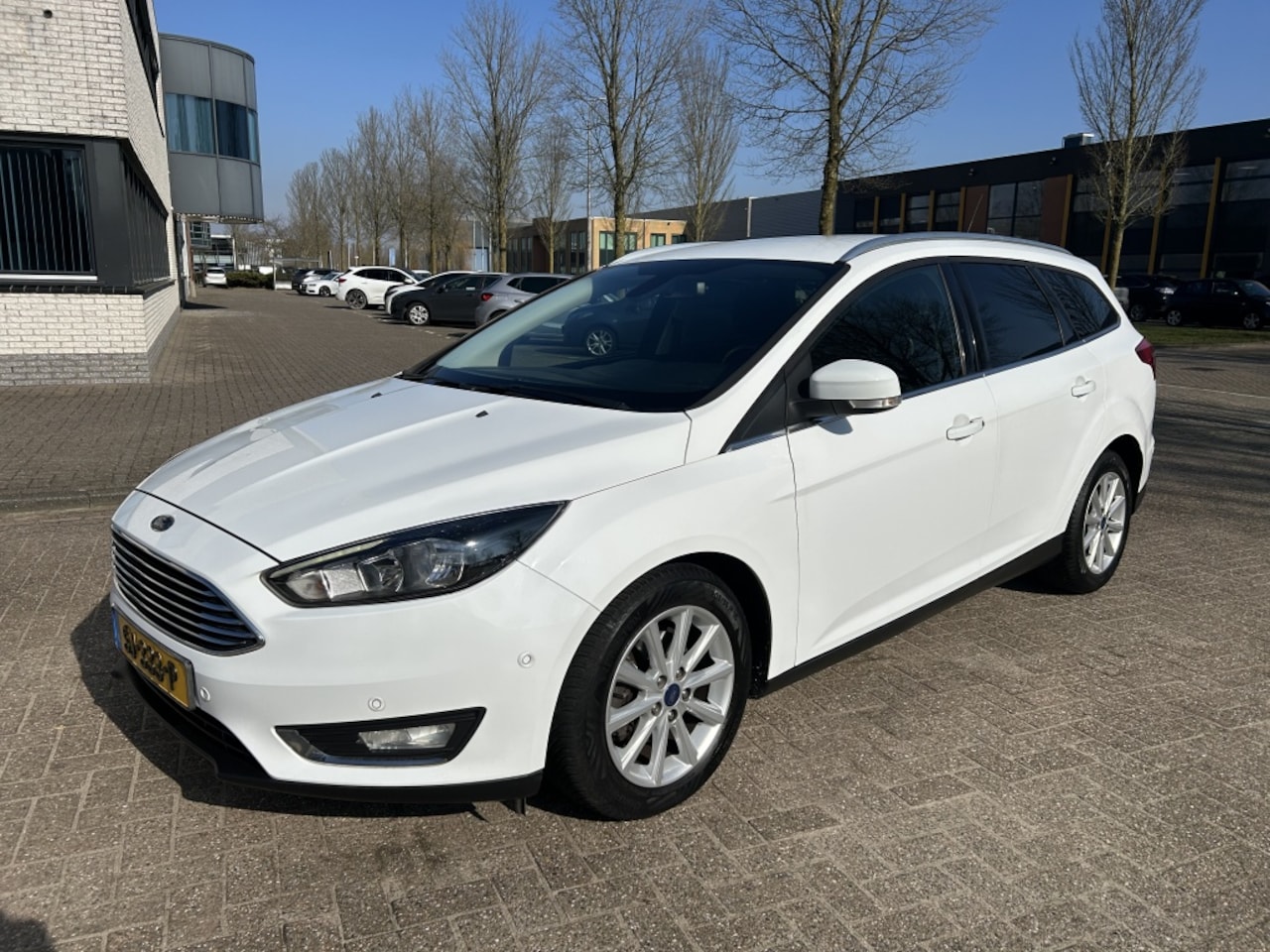 Ford Focus Wagon - 1.0 Titanium 125PK NAVI CRUISE STOELVW STUURVW. - AutoWereld.nl