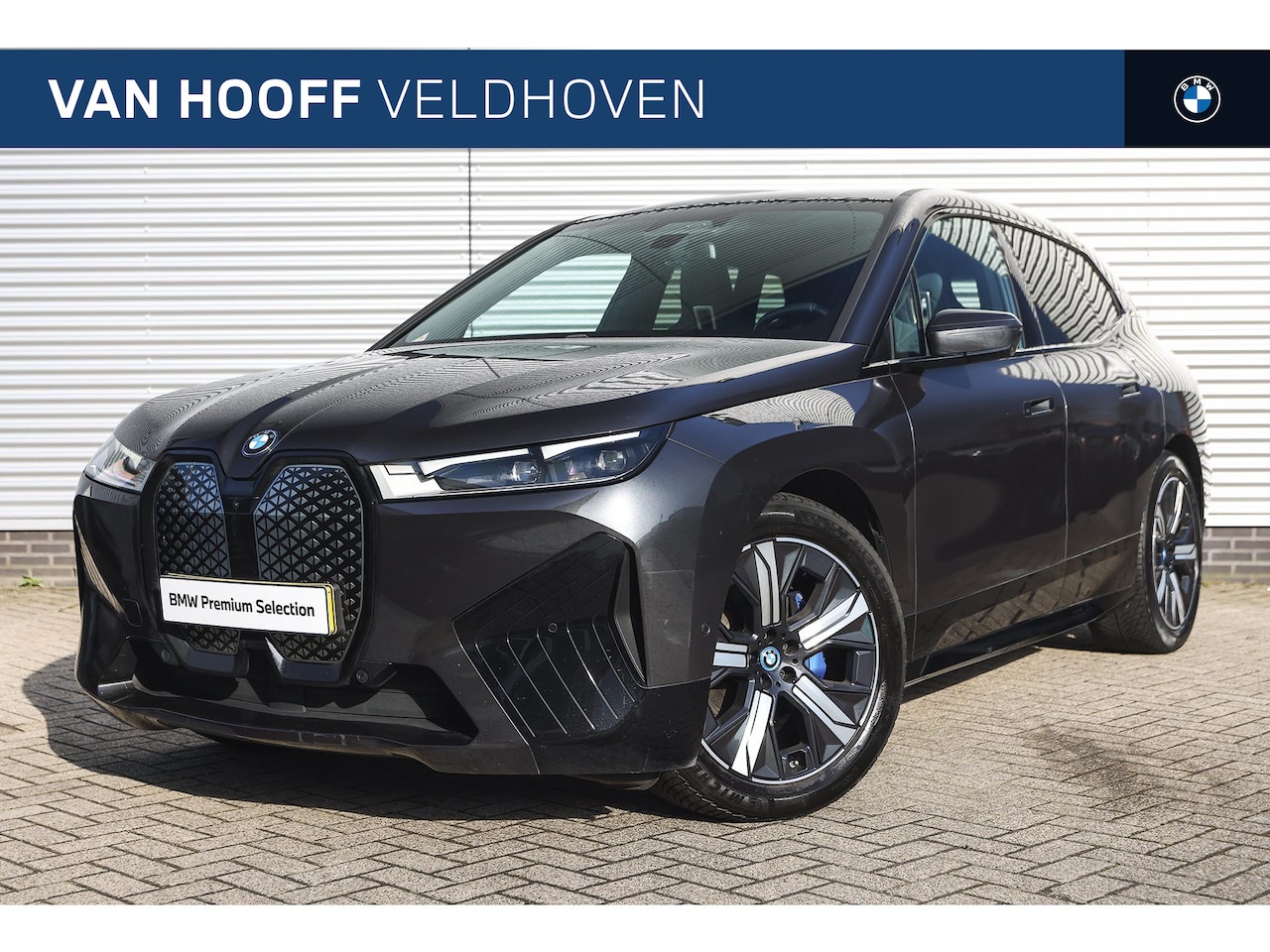 BMW iX - xDrive40 High Executive 77 kWh / Sportpakket / Panoramadak Sky Lounge / Stoelverwarming / - AutoWereld.nl