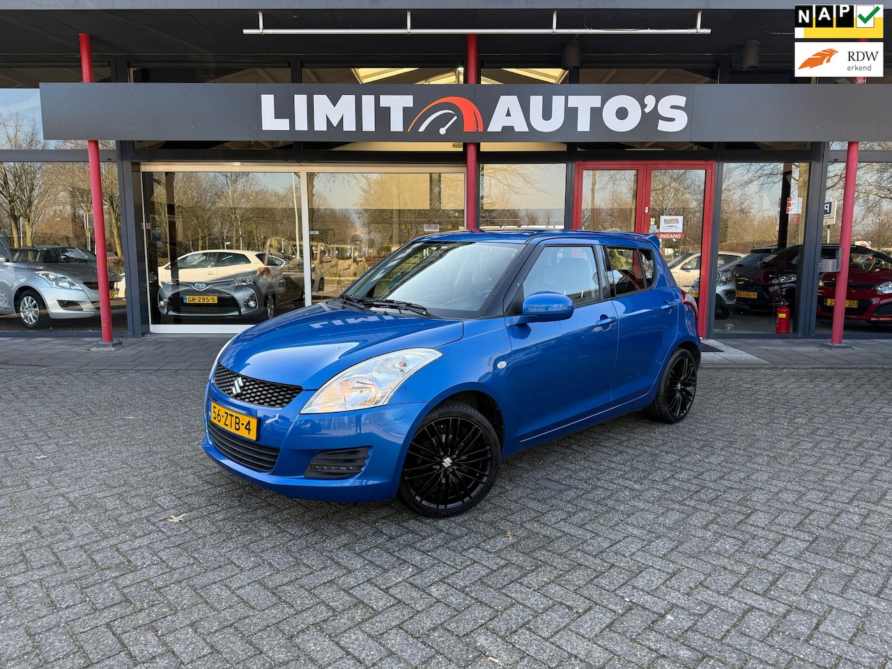 Suzuki Swift - 1.2 Comfort EASSS Airco/El.ramen/Lmv/Nap/Apk - AutoWereld.nl