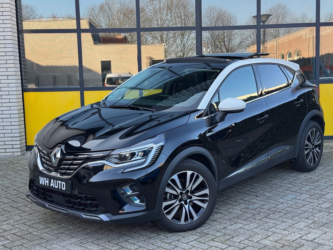 Renault Captur - 1.6 E-Tech Plug-in Hybrid 160 Initiale Paris, Panorama dak - AutoWereld.nl