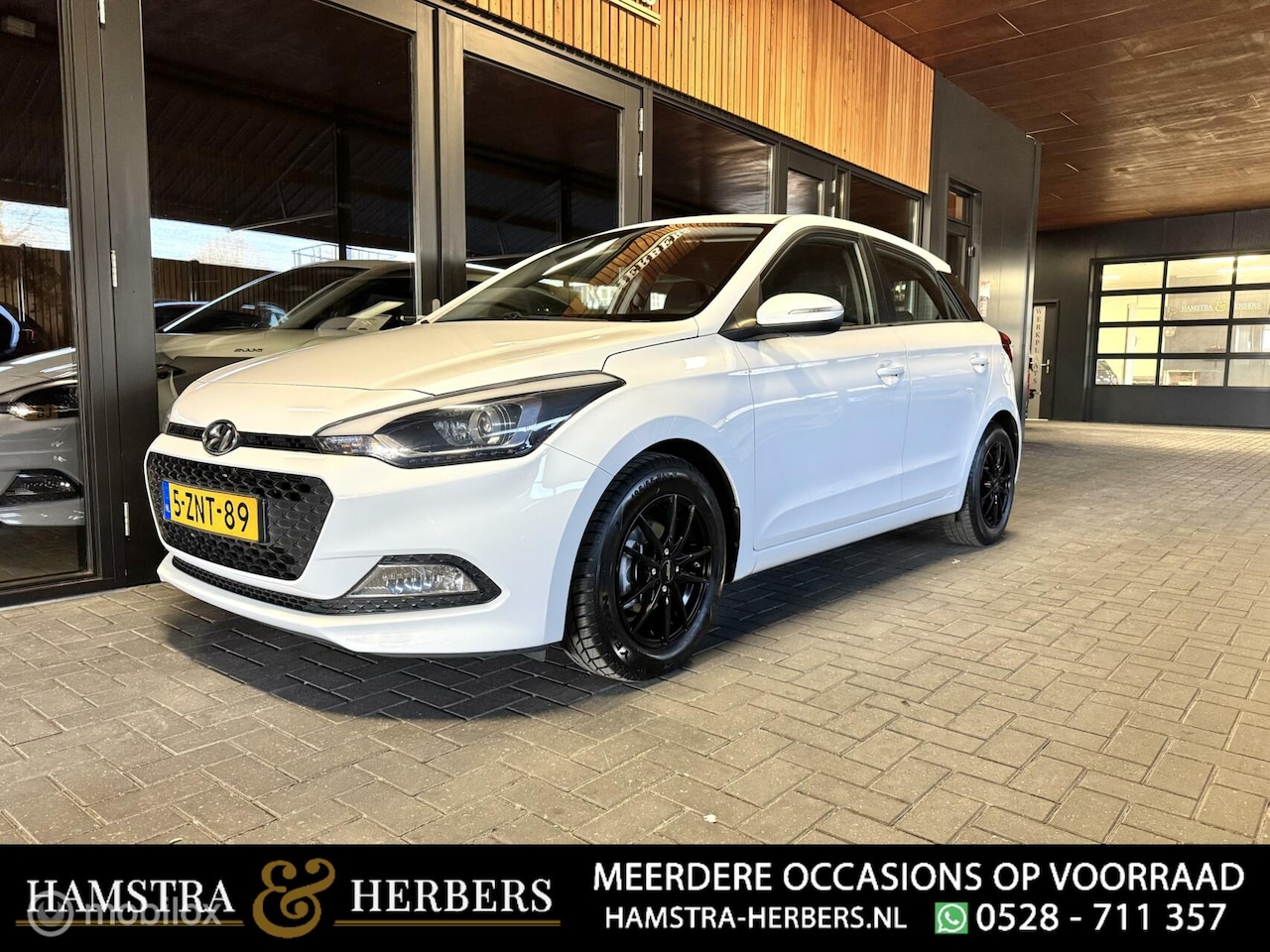 Hyundai i20 - 1.2 HP i-Motion Comfort wit - AutoWereld.nl