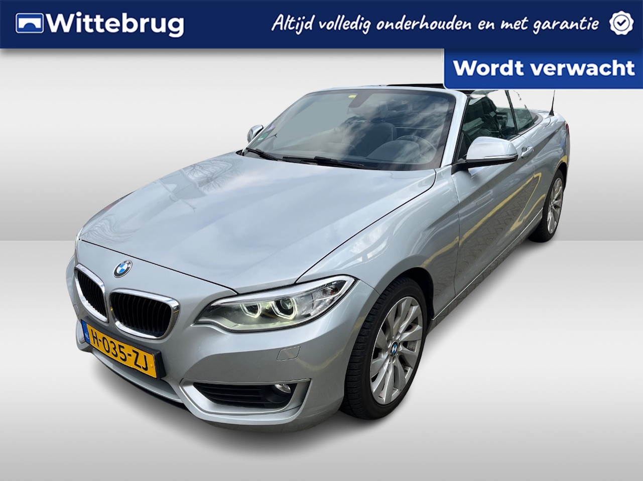 BMW 2-serie Cabrio - 220i Sport / Navigatie / Parkeersensoren achter / Stoelverwarming / - AutoWereld.nl