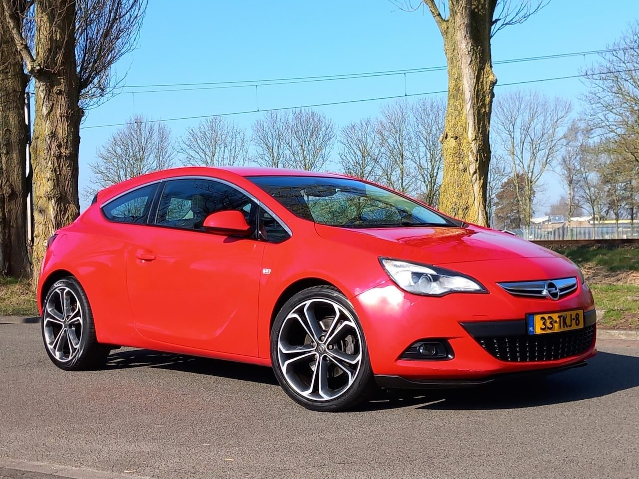 Opel Astra GTC - 1.4 Turbo Sport | Navigatie | Parkeersensoren - AutoWereld.nl