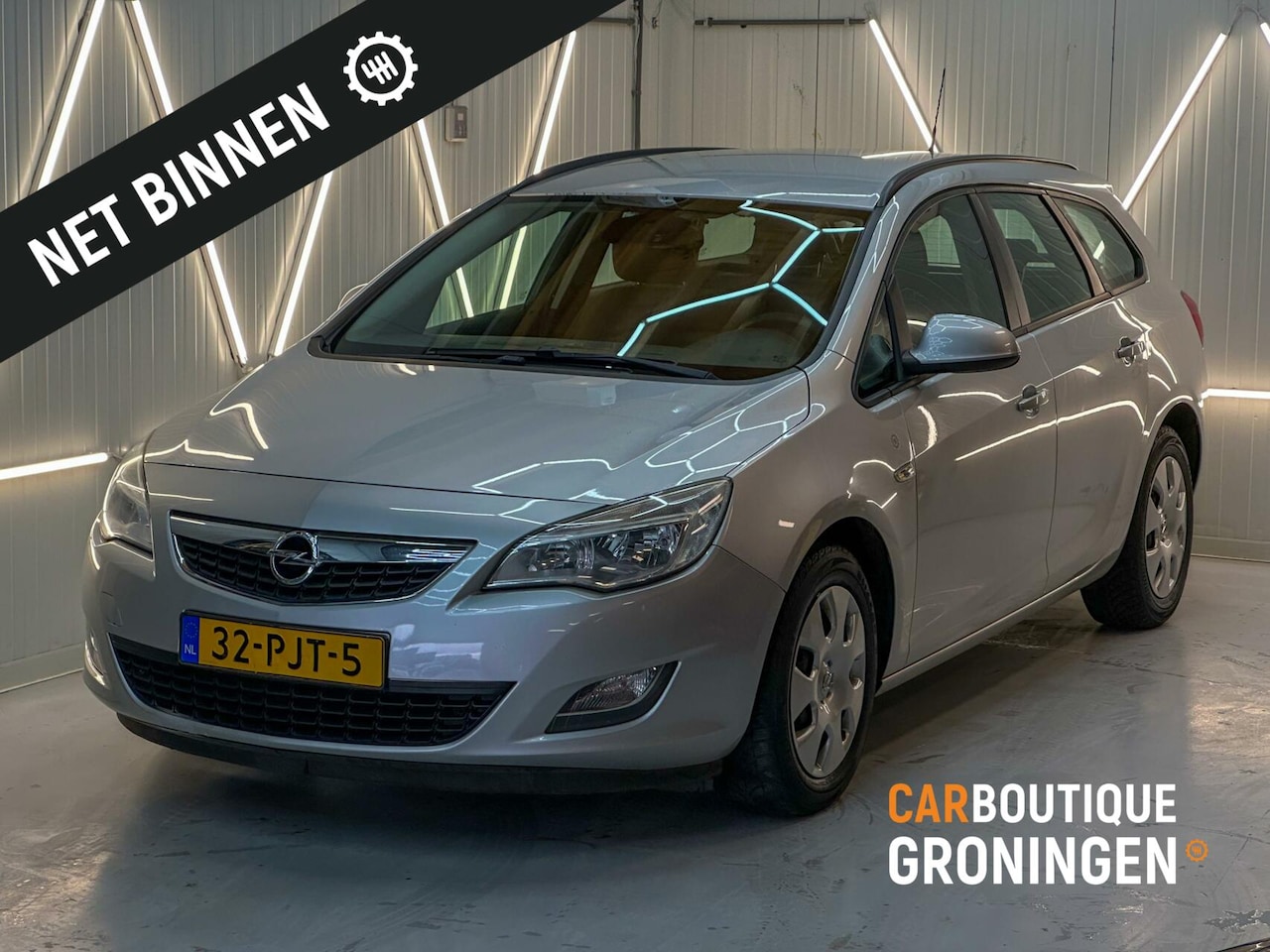 Opel Astra Sports Tourer - 1.3 CDTi S/S Cosmo | AIRCO | CRUISE | NAP - AutoWereld.nl