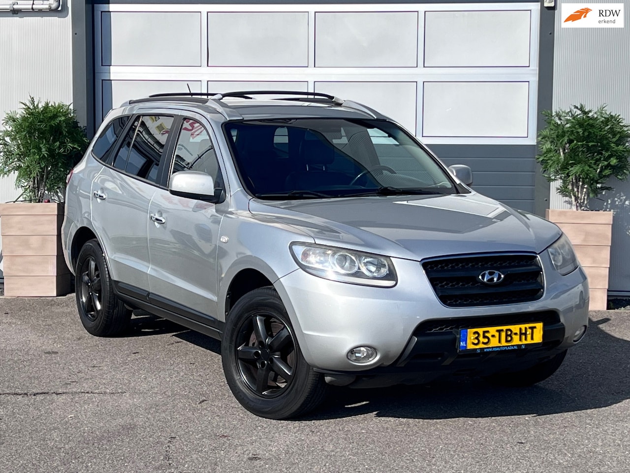 Hyundai Santa Fe - 2.7i V6 Style / AIRCO / LEER / NAP / TREKHAAK / INRUIL MOGELIJK - AutoWereld.nl