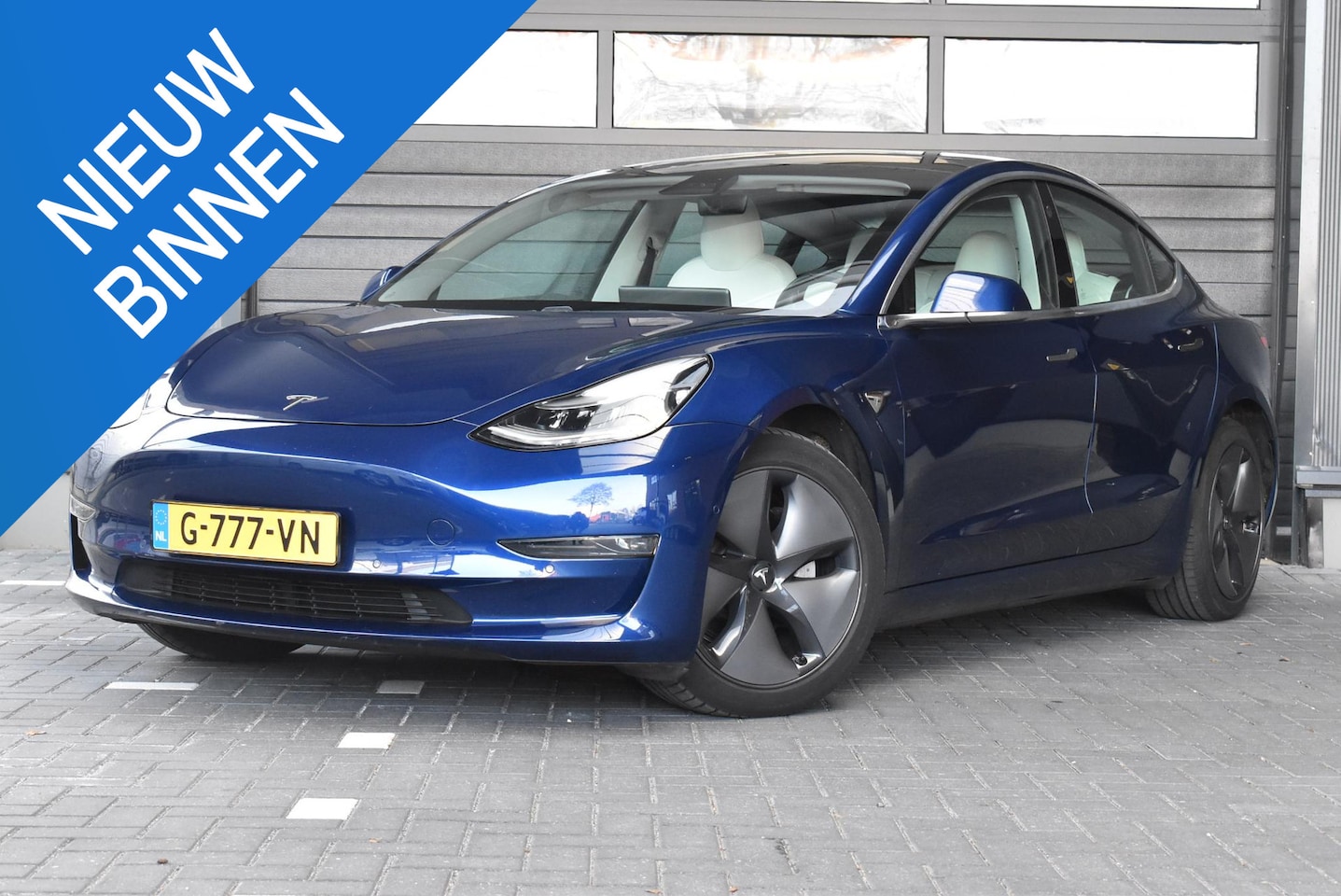 Tesla Model 3 - Long Range RWD Long Range AWD 75 kWh / Trekhaak / Wit leder / Autopilot - AutoWereld.nl