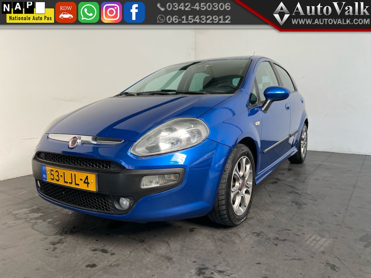 Fiat Punto Evo - 1.4 Racing. Clima. Trekhaak! - AutoWereld.nl