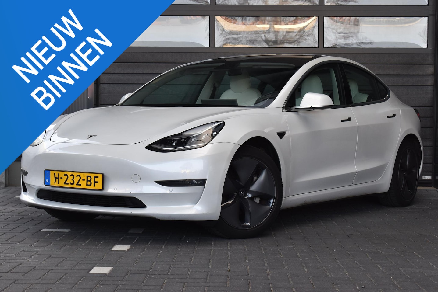 Tesla Model 3 - Long Range RWD Long Range AWD 75 kWh / Trekhaak / - AutoWereld.nl