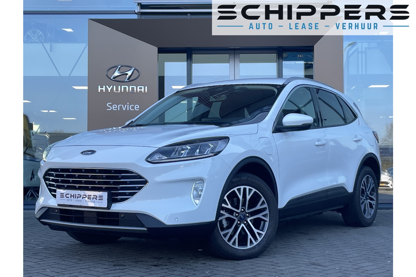 Ford Kuga - 2.5 PHEV Titanium Stuurwiel verwarmd | Navigatie | Achterbank verwarmd - AutoWereld.nl