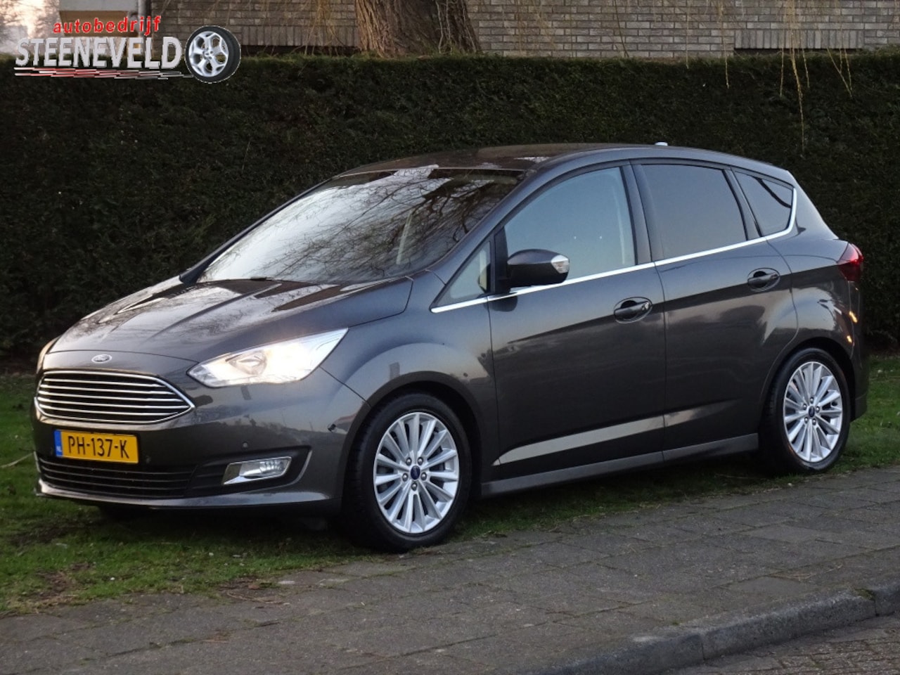 Ford C-Max - 1.0 125pk Titanium met Navi en Trekhaak - AutoWereld.nl