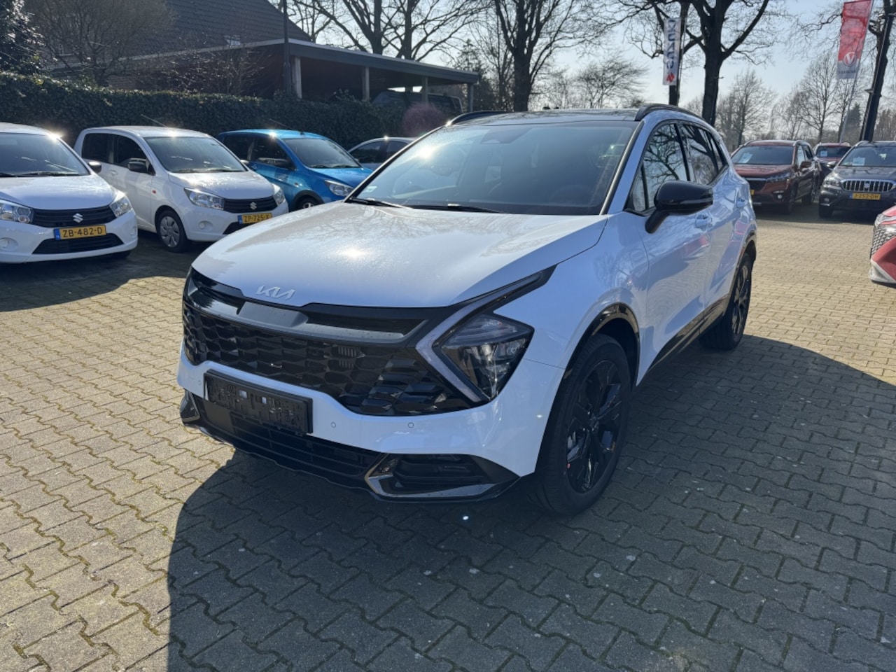 Kia Sportage - 1.6 T-GDi Hyb DarkEd - AutoWereld.nl